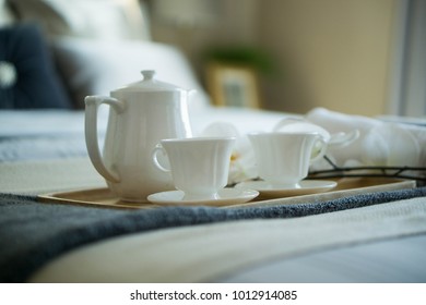 Waking up Teapot and tea cup Drinking coffee or tea in the bed 