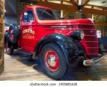 Walcott, Iowa, USA. November 30, 2020. A Red Vintage International Pick Up Truck, Inside Of The World's Largest Truck Stop Advertising The Iowa 80 Kitchen.     