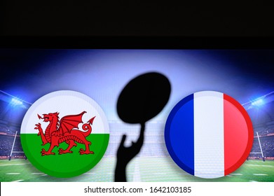 Wales vs France, Six nations Rugby match, Rugby ball in hand silhouette - Powered by Shutterstock