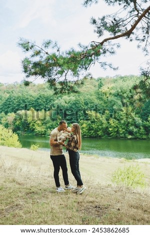 Similar – Women friends laughing while walking in forest