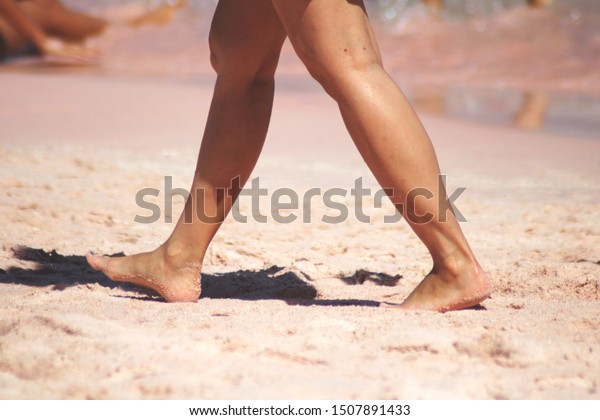 running on the beach without shoes