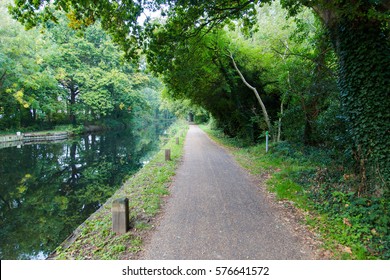 Walk Path In Park Hike Trail At Water Channels In Woking, Surrey, England