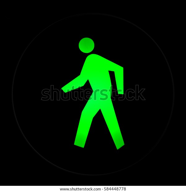 Walk\
sign for pedestrian at the trafic light,traffic light with green\
light and safe to move ( Pedestrian Traffic Lights\
)