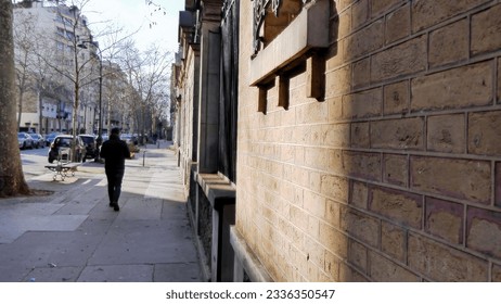 Walk through the streets of Paris, in a historical style, with brick or stone walls, strongly lit by the rays of the Sun, luminous phenomenal beauty, in a beautiful day, light on the walls - Powered by Shutterstock