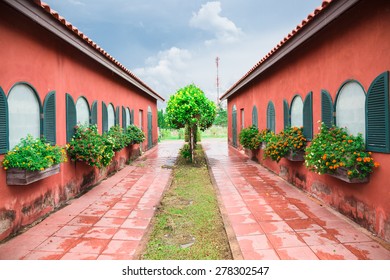 The Walk Way And Park With Window Flower Box In Cloudy Day 