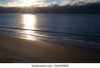 Walker on the sand at Myrtle Beach early in the morning - Powered by Shutterstock