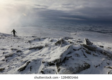 Walker In  Windy Winter Landscape, Ingleborough North Yorkshire