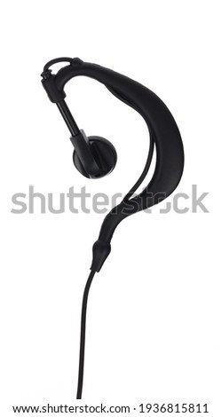 Walkie talkie two-way radio earpiece fbi style isolated on a white background.