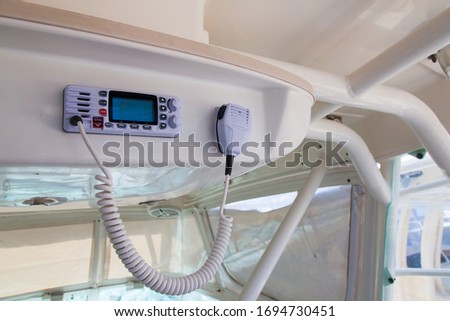 Walkie-talkie in the control cabin of a motor yacht.