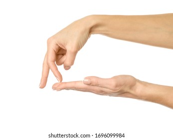 Walking To The Abyss. Woman Hand With French Manicure Gesturing Isolated On White Background. Part Of Series