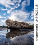 walking around an old ship wreck of City Dulas Anglesey