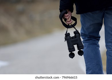 Walking with binoculars