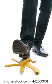 Walking Businessman Is Going To Slip On Banana Peel.