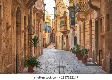 Walking Cobblestone Street In Birgu City, Malta