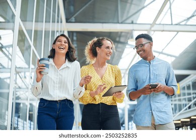 Walking, conversation and business people in office laughing, bonding and talking on lunch break. Happy, friends and group of creative directors with coffee, tablet and phone in workplace together. - Powered by Shutterstock