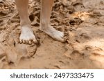 Walking earthing with red clay for health