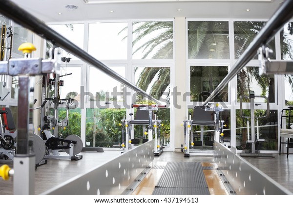 Walking\
Equipment With Parallel Bars At Rehab\
Center