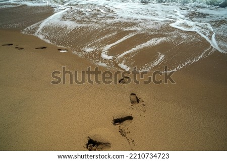 Similar – alone on 1ner island Ocean