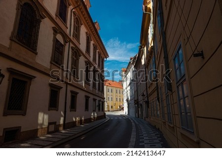 Walking on the beautiful streets of the old city of Prague in Czech Republic during a beautiful sunny summer day.