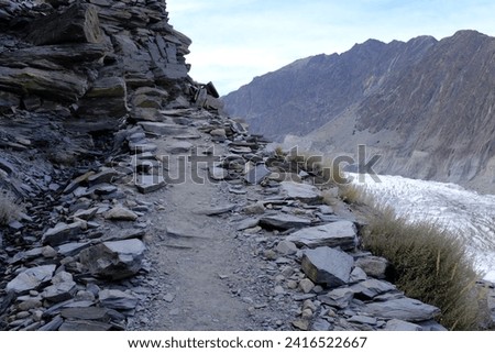 A walking path along the large ice field at Passu Glacier on the Karakoram Highway in the northern part of Gilgit-Baltistan.