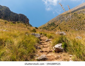 A walking path between the hills leading up the hill. Sicily