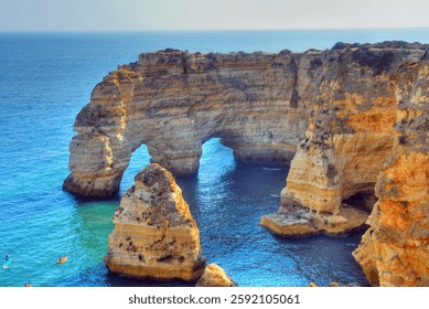 walking path with breathtaking views through the coast from porches to benagil caves lagoa algarve portugal