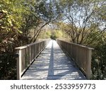 Walking path and bridge at Sippo Lake Park, Stark County, Ohio in the autumn in October