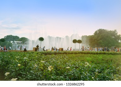 walking people in summer City Park, natural abstract background. weekend lifestyle. summer family active recreation. Big fountain in Gorky Park, Central Park culture and rest. Russia, Moscow - Powered by Shutterstock