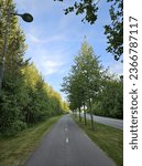 Walking Road with Trees in Linnanmaa, Oulu, Finland.