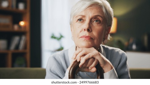 Walking stick, memory and senior woman in home with thinking, remember or nostalgia for past. Dreaming, medical support and elderly female person with cane for dementia disease in retirement facility - Powered by Shutterstock