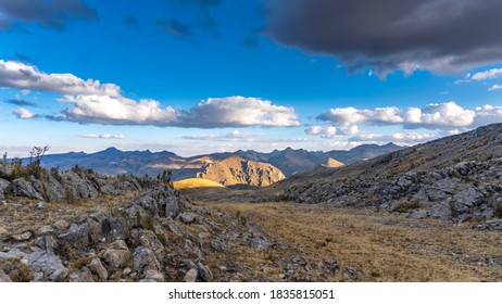 
walking at sunset on a hill in the Andes of Peru seeing strange rocky forms in the background - Powered by Shutterstock