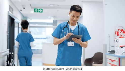 Walking, tablet or doctor in hospital with research on social media to search for medicine info online. Asian man reading, smile or medical healthcare nurse browsing on technology for telehealth news - Powered by Shutterstock