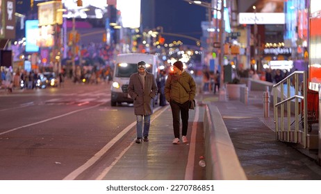 Walking through the streets at Times Square in New York - travel photography - Shutterstock ID 2270786851