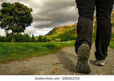 Walking Tour, Human Legs Walking, A Valley In The Lake District In The North West Of England In Cumbria