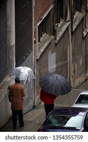 Walking under the rain
