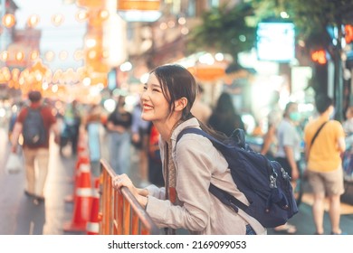 Walking young adult asian woman traveller backpack. People traveling in city lifestyle chinatown street food market Bangkok, Thailand. Staycation southeast asia summer trip concept. - Shutterstock ID 2169099053