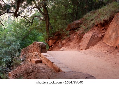 Walkway Along A Red Dirt Path In Zion National Park