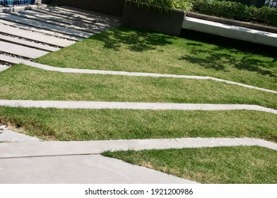 Walkway around home by grass ,  architecture design of grass field around home , green grass , home outdoor decoration concept