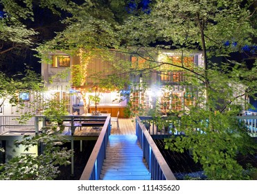 Walkway And Back Porch Of A Nice House In The Woods.