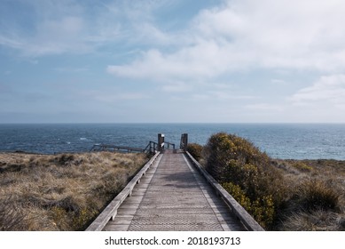 A Walkway Disapearing Into The Lanscape Of The Sea In Melbourne Australia.