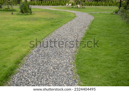 Walkway pathway s curve in public park. 