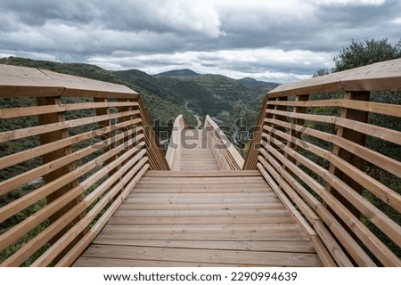 Côa walkways, a wooden structure with a length of 930 meters and 890 steps, in Fos Côa, Portugal on a very cloudy day