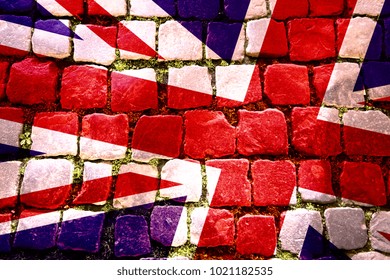 Wall Art showing a Union Jack flag overlaid onto Cobbles, with weed and grass growing between the cobblestones