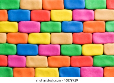 Wall Background Made Of Colorful Child's Play Clay Bricks