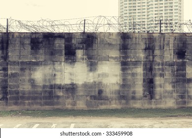 Wall With Barbed Wire Fence