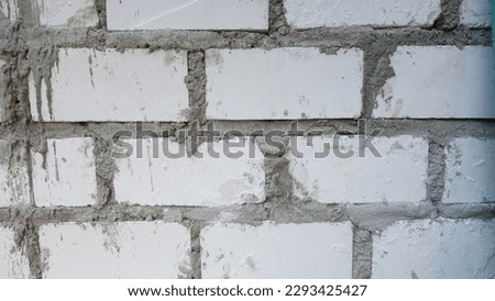 wall with a beautiful texture with gray color, made of graystone and cement