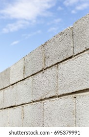 Wall from block against sky - Shutterstock ID 695379991