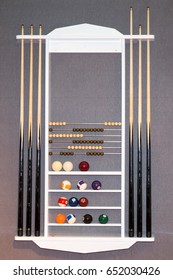 Wall Bracket For Storing Tails And Billiard Balls Cues On Grey Background