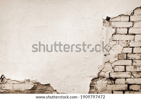 Wall Brick Peeling Plaster Background. Sepia Toned Brickwall Texture For Design.
