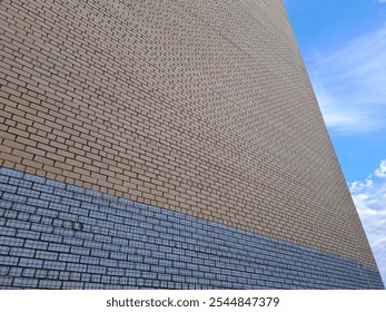 a wall of bricks, a piece of sky